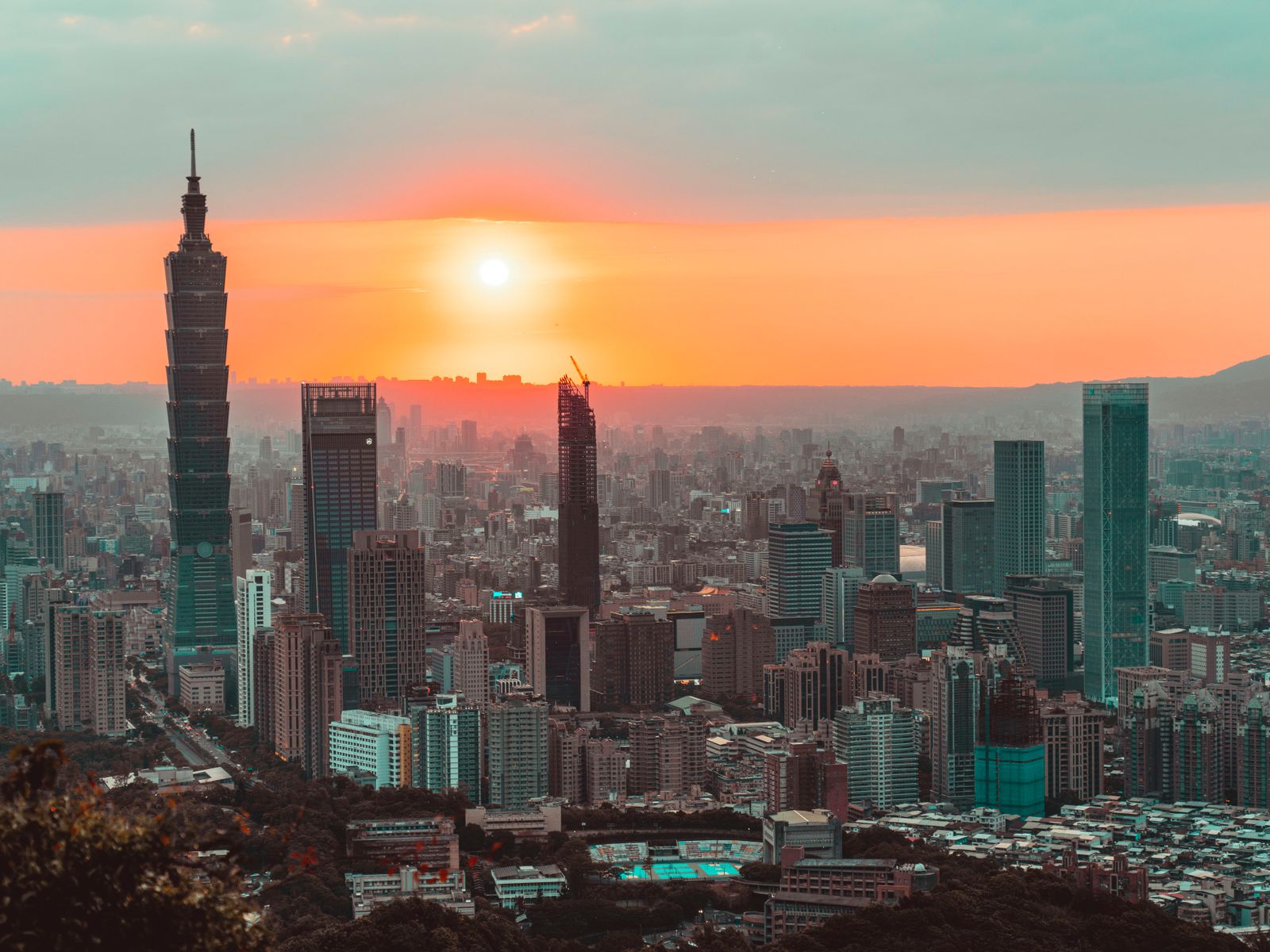 Breathtaking view of Taipei's skyline with iconic Taipei 101 at sunset